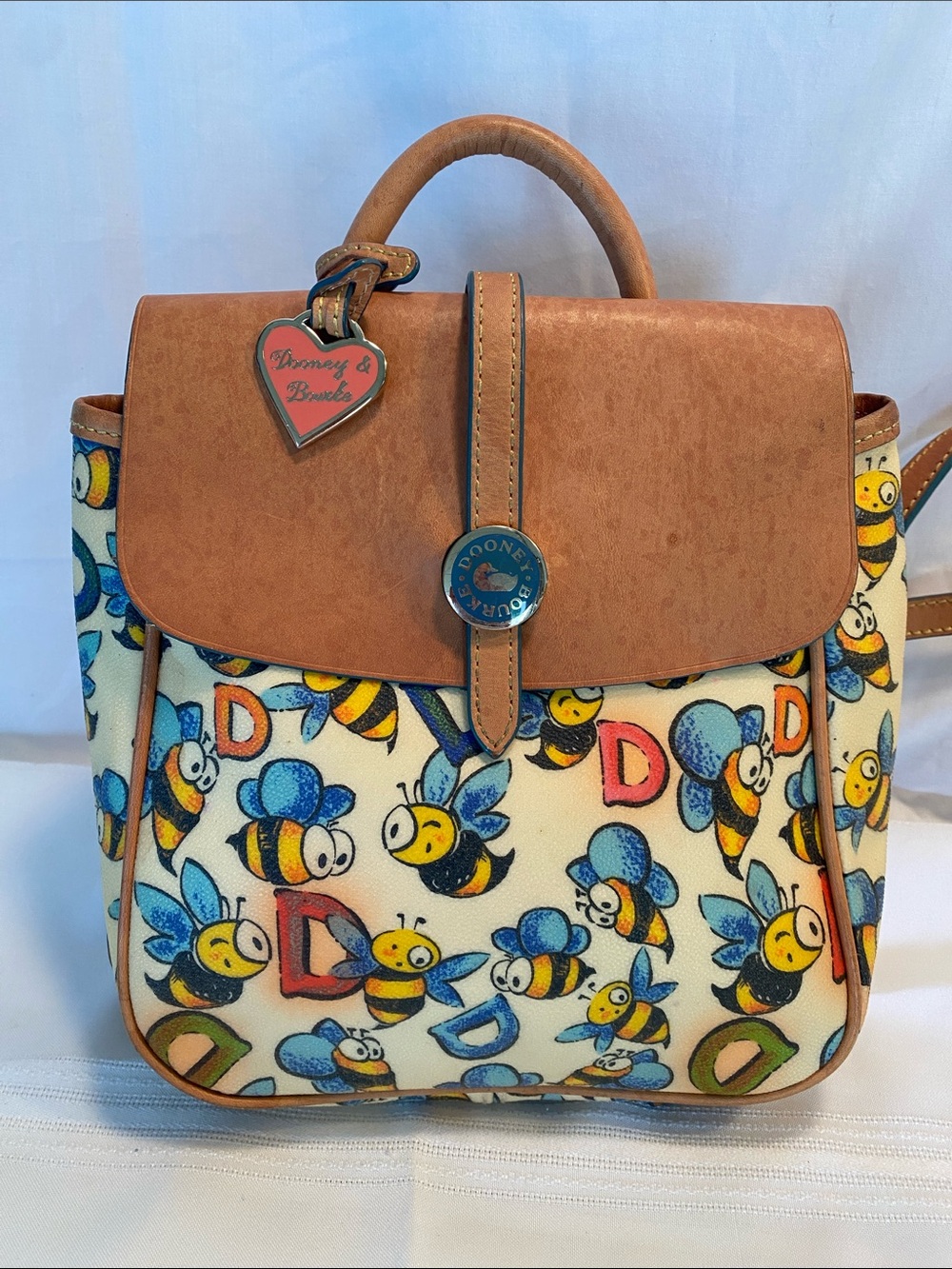 Dooney & Bourke Bee Print Satchel in Tan and Cream with Blue & Yellow Accents